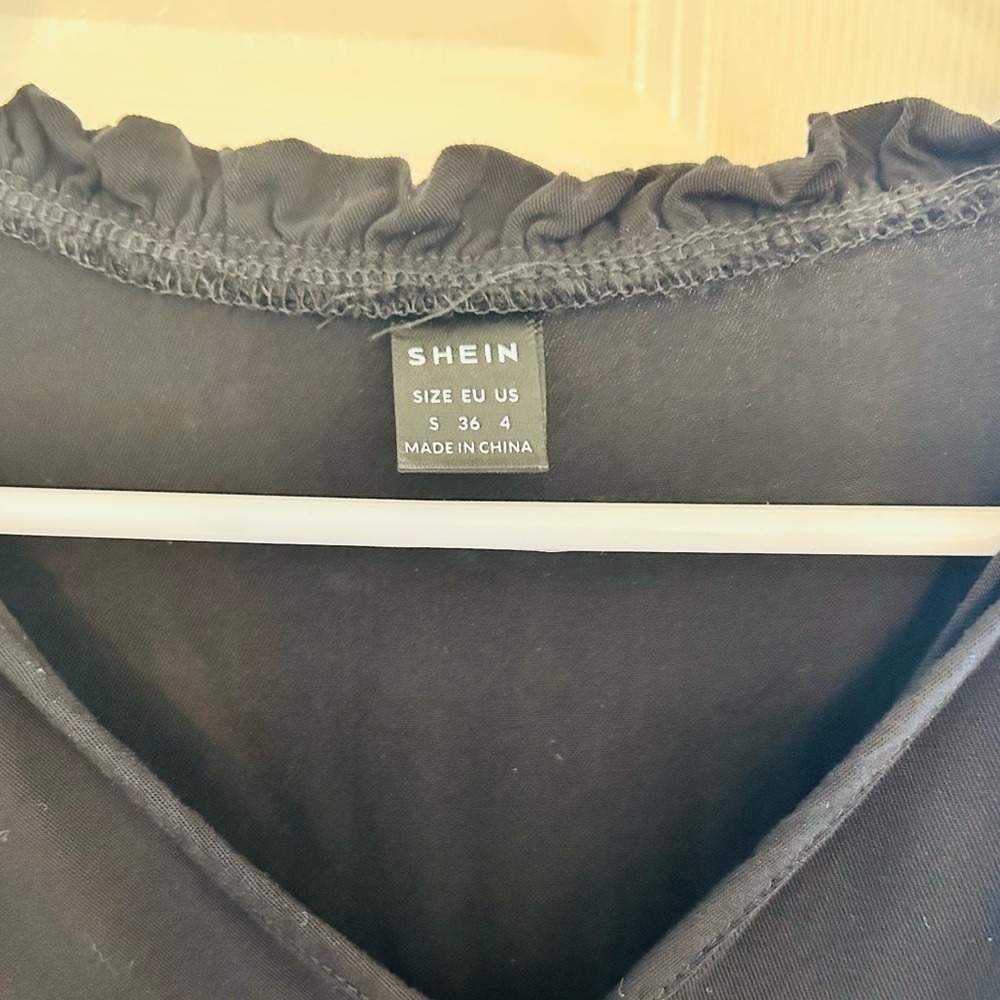 Ruffled Black Flowy Tunic Top with Buttons Size Small NWOT - Picture 3 of 4